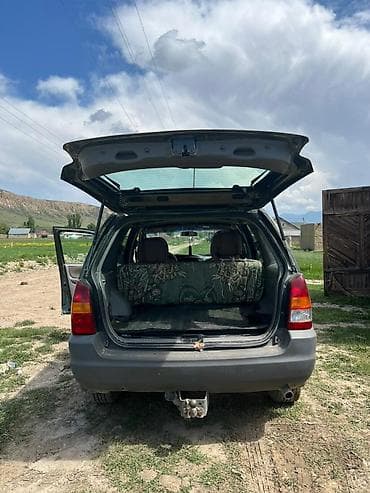Mazda Tribute: 2002 г., 2 л, Кол менен иштөөчү, Кроссовер — 7