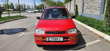 mitsubishi lanser: Daihatsu Cuore: 1995 г., 0.8 л, Ручные, Бензин, Хэтчбэк — 4