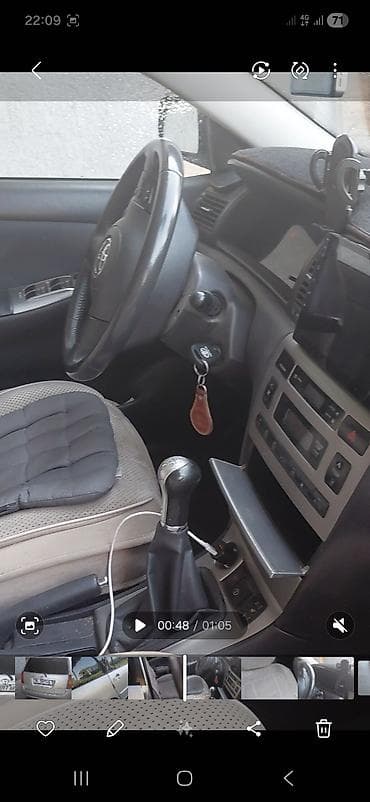 мултируль: Toyota Corolla: 2005 г., 1.6 л, Механика, Бензин, Универсал — 10