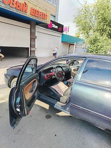 mini coper: Mazda 626: 1995 г., 1.8 л, Механика, Бензин, Седан — 5