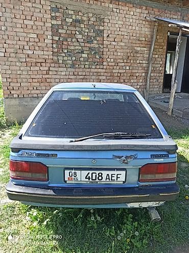 для такси авто: Mazda 323: 1985 г., 1.5 л, Механика, Бензин, Хэтчбэк — 5