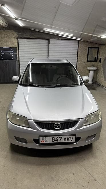 Mazda 323: 2001 г., 1.6 л, Механика, Бензин, Универсал