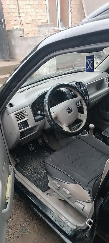 jac m3: Mazda Demio: 2000 г., Автомат, Бензин, Хэтчбэк — 7