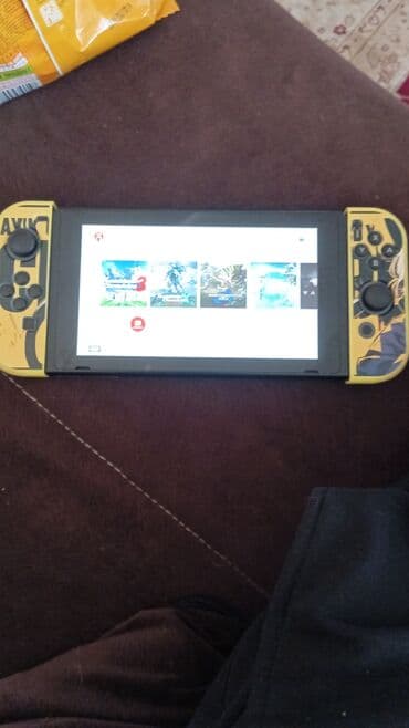 медиа приставка для телевизора: Игровая консоль Nintendo Switch, известная своей универсальностью — 2