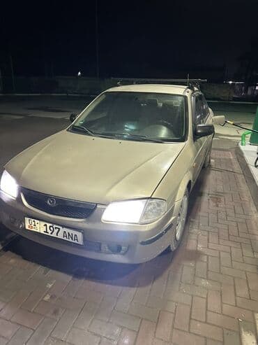 Mazda 323: 2001 г., 1.6 л, Механика, Бензин, Седан