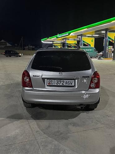 step rf3: Mazda 323: 2003 г., 1.6 л, Ручные, Бензин, Универсал — 3