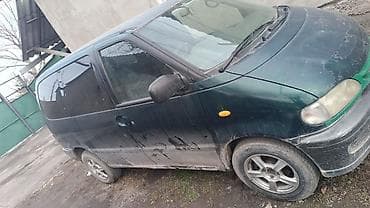 сидения на нексия: Nissan Serena: 1998 г., 2 л, Автомат, Бензин, Минивэн — 5