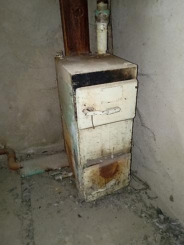 куплю деревья на дрова: Твердотопливная печь-колонка (котёл) для отопления/нагрева воды. - — 1