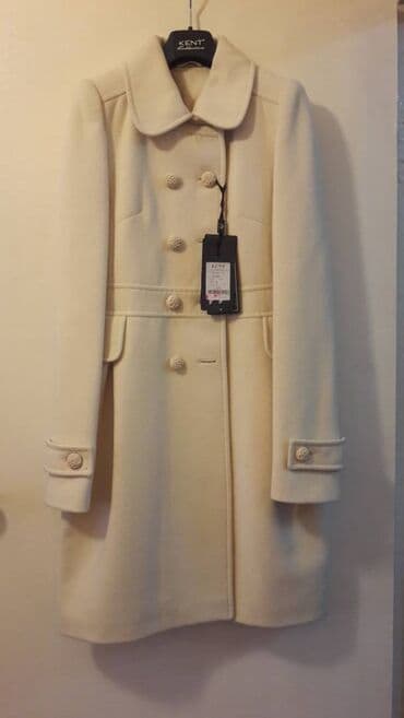 теплый и удобный: Красивое, теплое пальто молочного цвета. Бренд - Kent. Производство - — 1