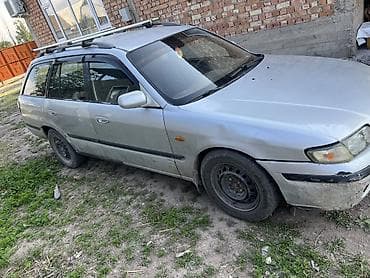 стабилизатор демио: Mazda Capella: 1998 г., 1.8 л, Механика, Бензин, Универсал — 4