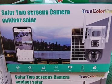 солнечный фанарик: Солнечная уличная камера наблюдения TrueColorView с двумя экранами — 1