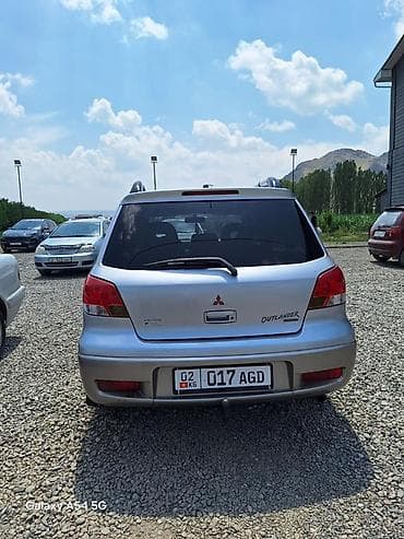 highlander platinum: Mitsubishi Outlander: 2004 г., Кроссовер — 2