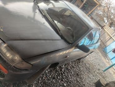 дайво мубира: Mazda 323: 1995 г., 1.5 л, Механика, Бензин, Седан — 4