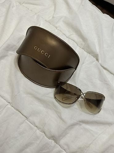 forerunner 970: Солнцезащитные очки Gucci с фирменным футляром. - Модель — 1