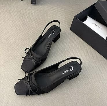 Элегантные женские босоножки черного цвета с открытой пяткой и
