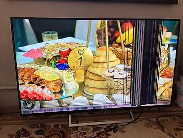 ТВ и видео: Телевизор с большим экраном (примерно 50–55"). Тонкие рамки — 1