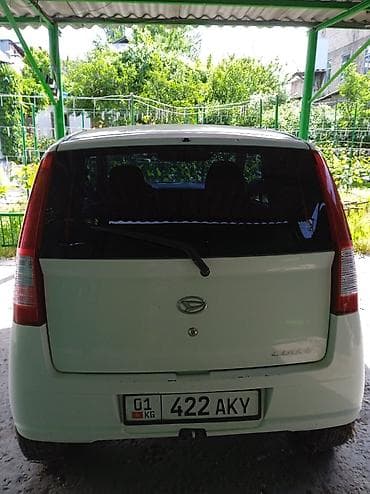 юта 704: Daihatsu Cuore: 2004 г., 1 л, Механика, Бензин, Хэтчбэк — 3