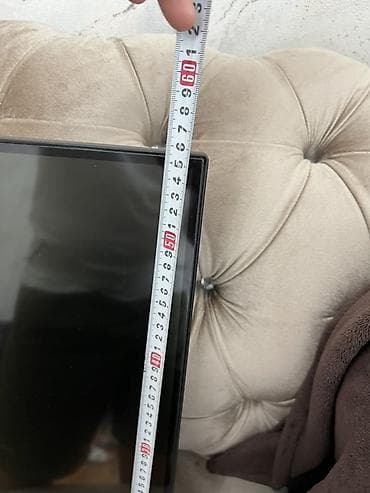 sky vision: Телевизор SKYWORTH, диагональ около 40–43" (высота экрана ~58–60 см) — 4