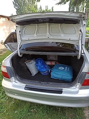 keyless go: Mazda Capella: 2000 г., 1.8 л, Автомат, Бензин, Седан — 7