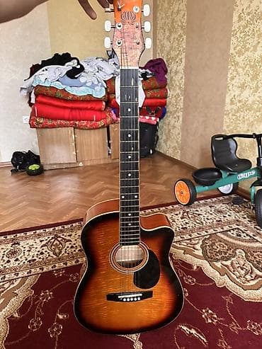 Гитары: Акустическая гитара с вырезом (cutaway), форма корпуса — — 4