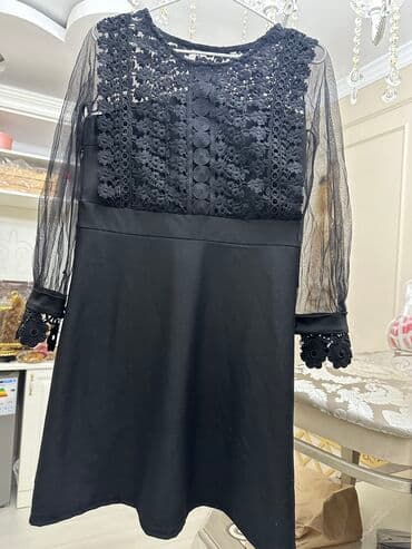вечерние платья из трикотажа: Продается черное платье длина по колено размер мка — 2
