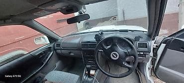 споллер: Subaru Forester: 2001 г., 2 л, Автомат, Газ, Универсал — 1