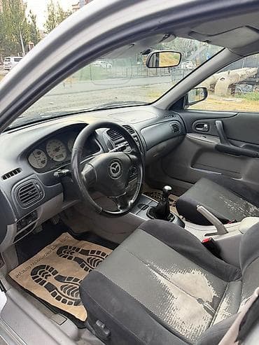 launch 431: Mazda 323: 2003 г., 1.6 л, Механика, Бензин, Универсал — 5