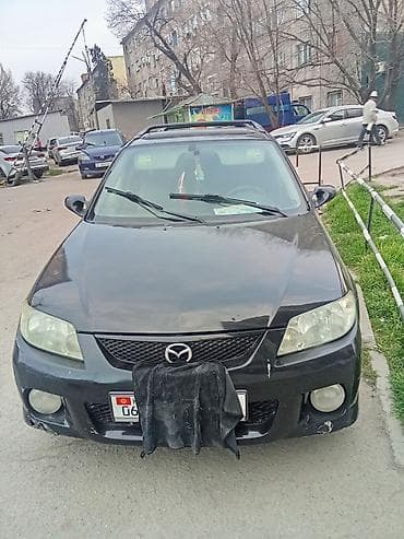 мазда фамилия: Mazda Familia: 2000 г., Ручные, Бензин, Универсал — 1