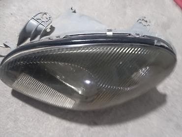 автомобильные лампы: Левая передняя фара в сборе для автомобиля Деу Ланос — 1