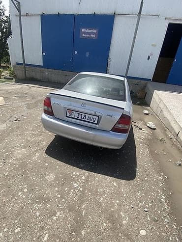 простой: Mazda 323: 2000 г., 1.6 л, Автомат, Бензин, Седан — 2