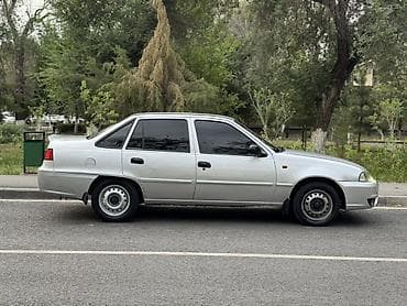 електронный машина: Daewoo Nexia: 2012 г., 1.6 л, Механика, Бензин, Седан — 2
