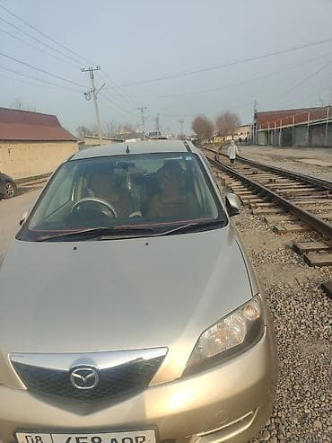 Mazda: Mazda Demio: 2003 г., 1.3 л, Автомат, Бензин, Хэтчбэк — 2