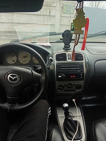 мазда фамилия: Mazda Familia: 2000 г., Ручные, Бензин, Универсал — 4