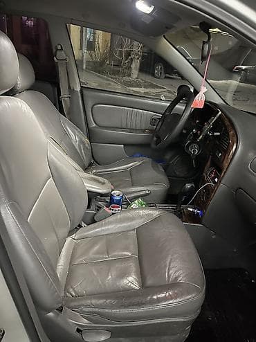 e53 4 8: Kia Shuma: 2002 г. — 5