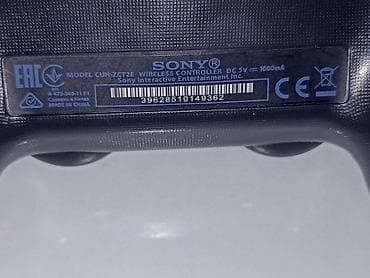 музыкальный пульт: Беспроводной геймпад Sony DualShock 4 (модель CUH‑ZCT2E), оригинал — 4