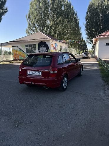 ваз 2112: Mazda 323: 1998 г., 1.5 л, Механика, Бензин, Хэтчбэк — 6