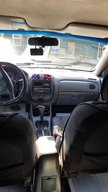 мазда 621: Mazda 323: 1999 г., Автомат, Универсал — 2