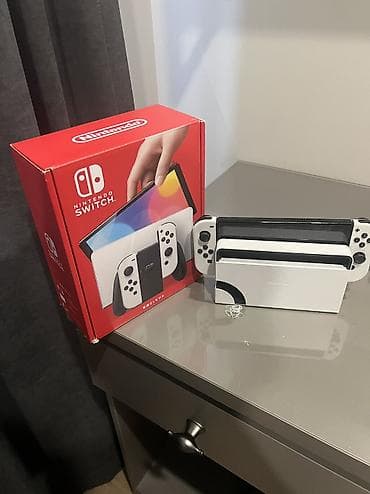 Nintendo Switch OLED (белая версия) Комплектация: - Консоль Nintendo