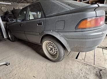 second tech: Mazda 323: 1990 г., 1.6 л, Механика, Бензин, Хэтчбэк — 9