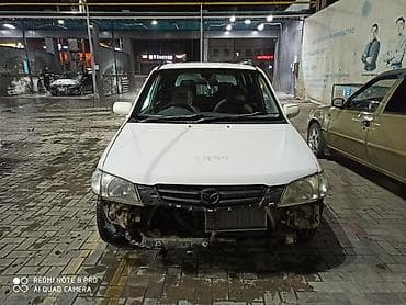 тачки б у: Mazda Demio: 1999 г., 1.4 л, Автомат, Бензин, Минивэн — 4
