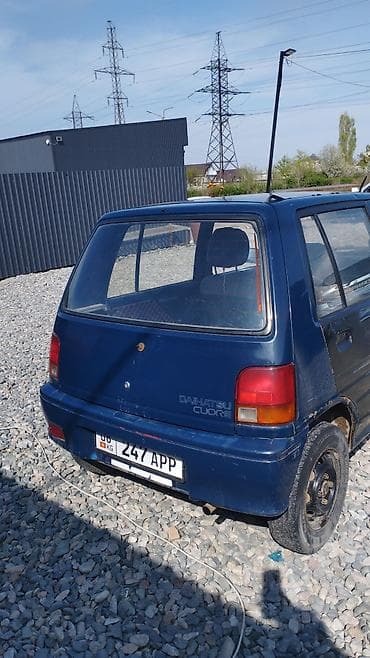 машина делика: Daihatsu Cuore: 1991 г., 0.8 л, Ручные, Бензин, Хэтчбэк — 4