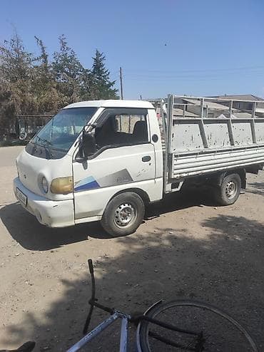 дордой мото: Грузовой малотоннажный бортовой автомобиль (кабина над мотором), белый — 2