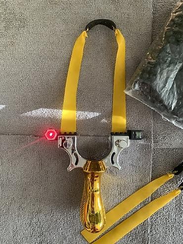 рогатка для охоты: Рогатка с лазером (Золотой) Комплект: Сама рукоять 600шт пули из глины — 3