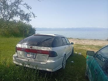 соната жёлтый: Honda Accord: 2000 г., Механика, Универсал — 3