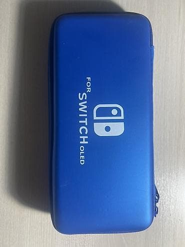 nintendo switch сколько стоит: Игровая консоль Nintendo Switch OLED (белые Joy‑Con) - Экран 7" OLED — 8