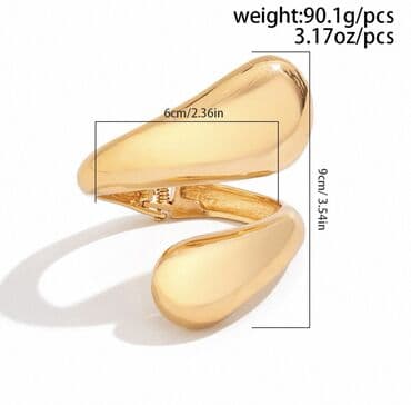 свадебные платья с открытой спиной: Стильные массивные браслеты — яркий акцент в вашем образе. Плотные — 2