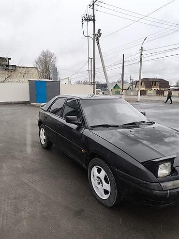 belarus mtz: Mazda 323: 1991 г., 1.8 л, Механика, Бензин, Хэтчбэк — 4