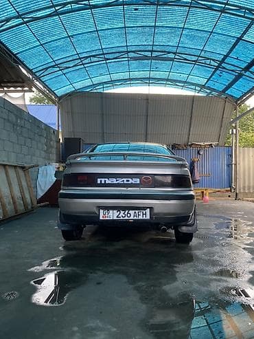 Mazda 323: 1991 г., 1.8 л, Механика, Бензин, Лифтбек — 4