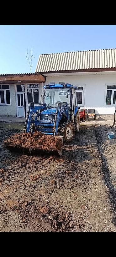 Фронтальный трактор с погрузчиком и навесным оборудованием - Грузовой