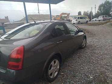 sg 9: Nissan Primera: 2002 г., Бензин, Седан — 1